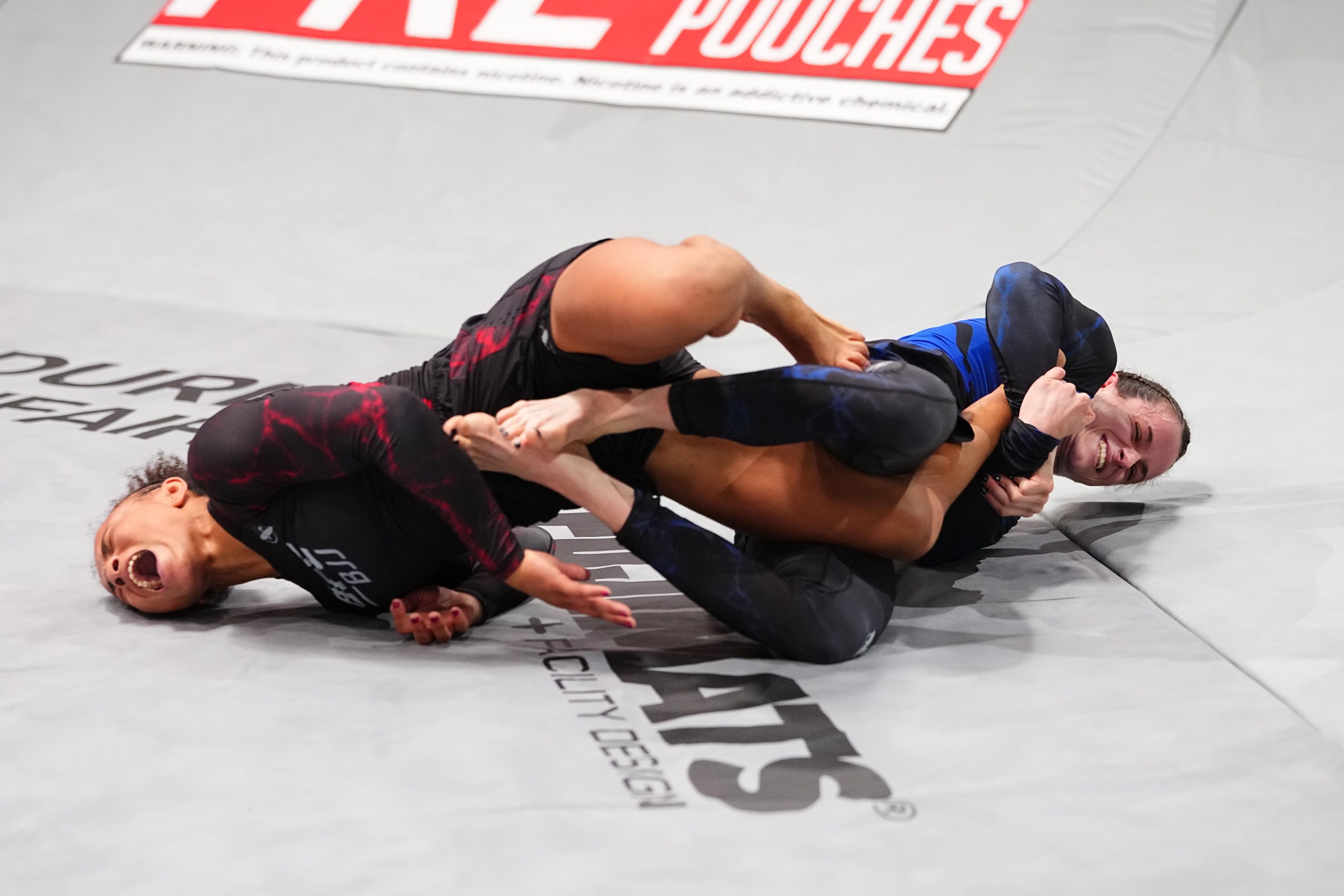 LAS VEGAS, NEVADA – OCTOBER 08: (R-L) Adele Fornarino of Australia works for a submission against Cassia Moura of Brazil in the women’s flyweight title match during the UFC BJJ 12 event at Meta APEX on October 08, 2026 in Las Vegas, Nevada.