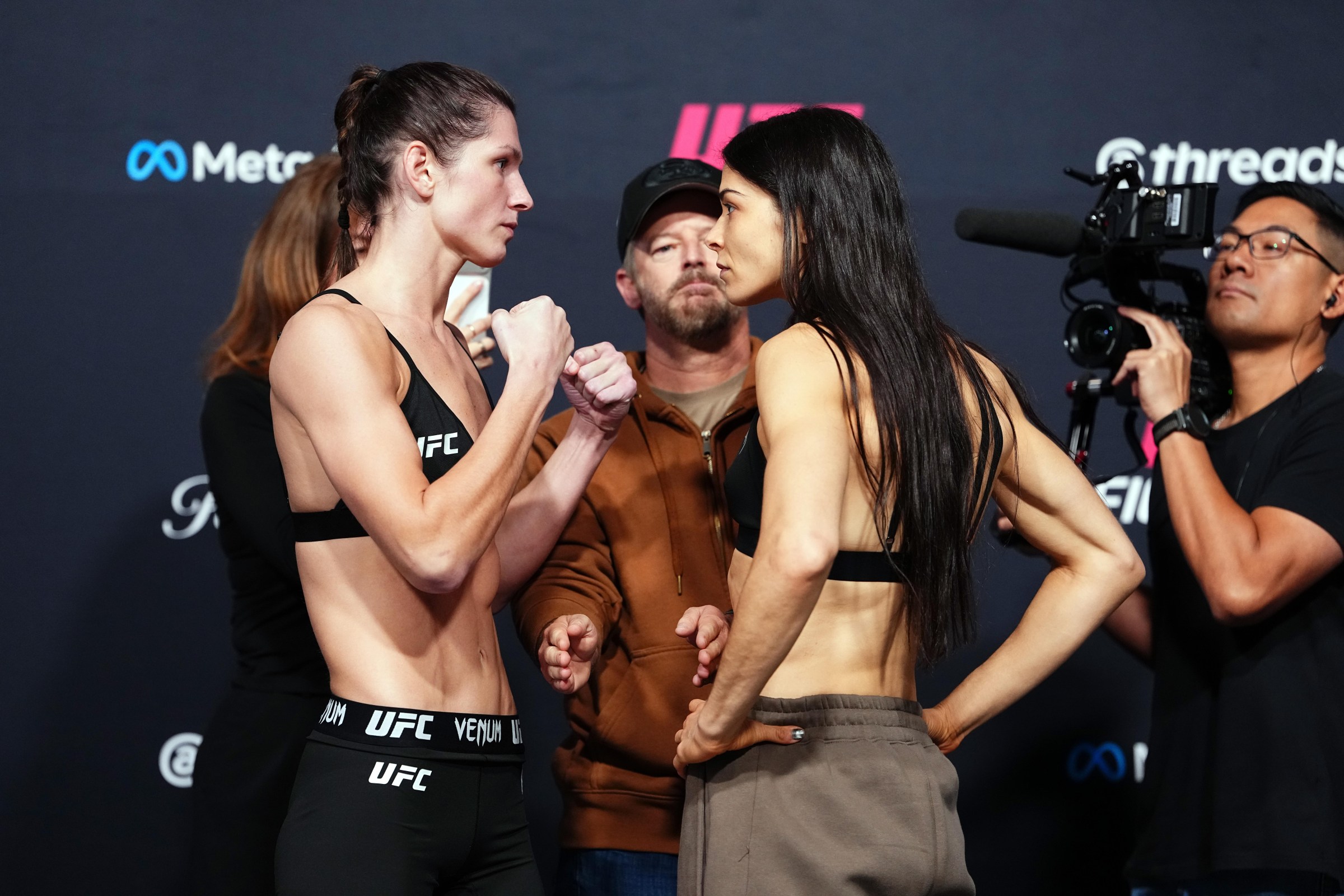 LAS VEGAS, NEVADA - OCTOBER 09: (L-R) Ernesta Kareckaite of Lithuania and Melissa Gatto of Brazil face off during the UFC Fight Night weigh-in event at Meta APEX on October 09, 2026 in Las Vegas, Nevada. (Photo by Jeff Bottari/Zuffa LLC)