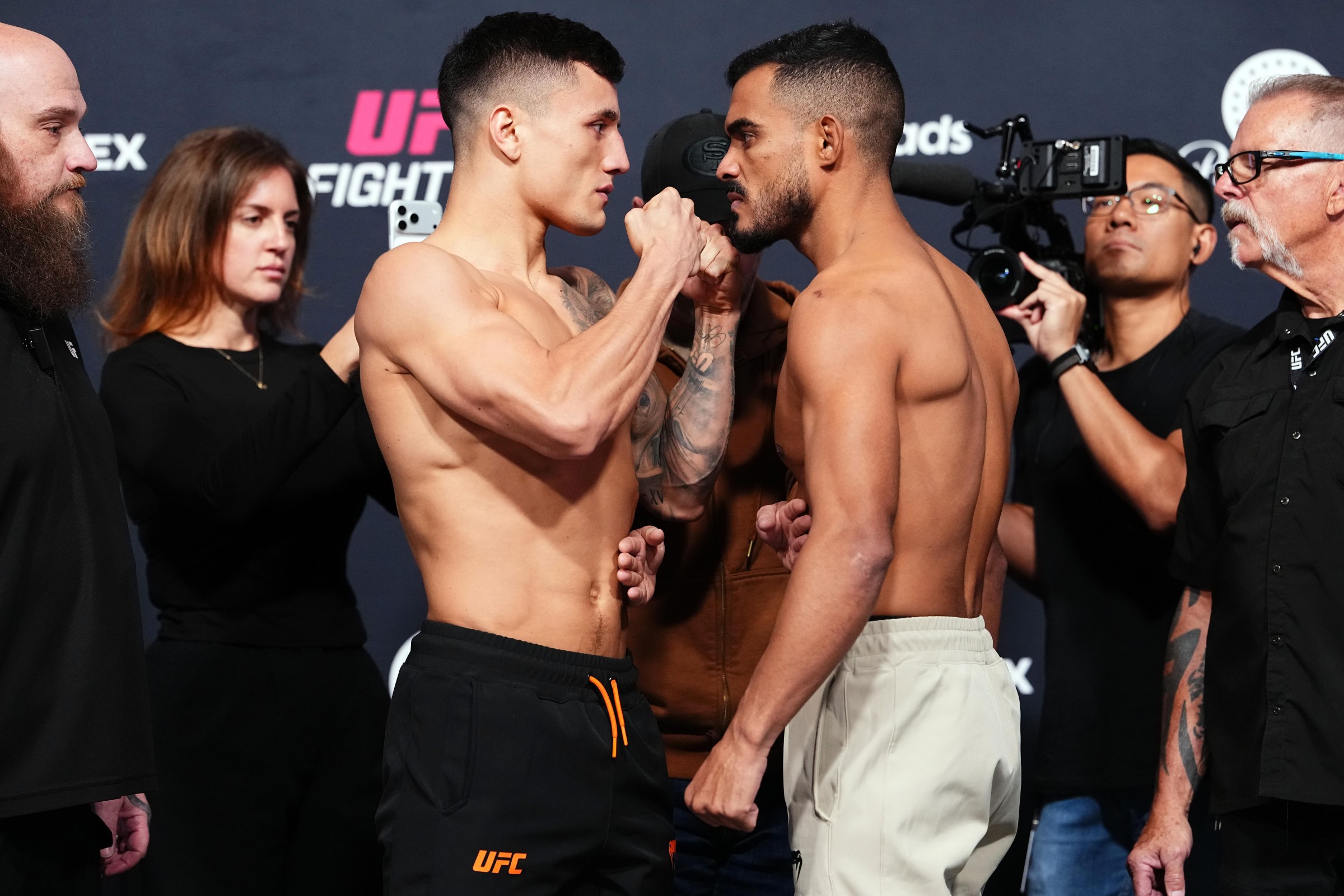 LAS VEGAS, NEVADA - OCTOBER 09: (L-R) Francisco Prado of Argentina and Ismael Bonfim of Brazil face off during the UFC Fight Night weigh-in event at Meta APEX on October 09, 2026 in Las Vegas, Nevada. (Photo by Jeff Bottari/Zuffa LLC)
