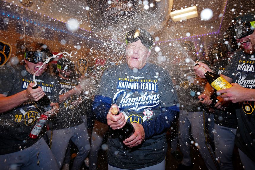 Brewers manager Pat Murphy is sprayed with champagne after his team swept the Dodgers on Thursday.