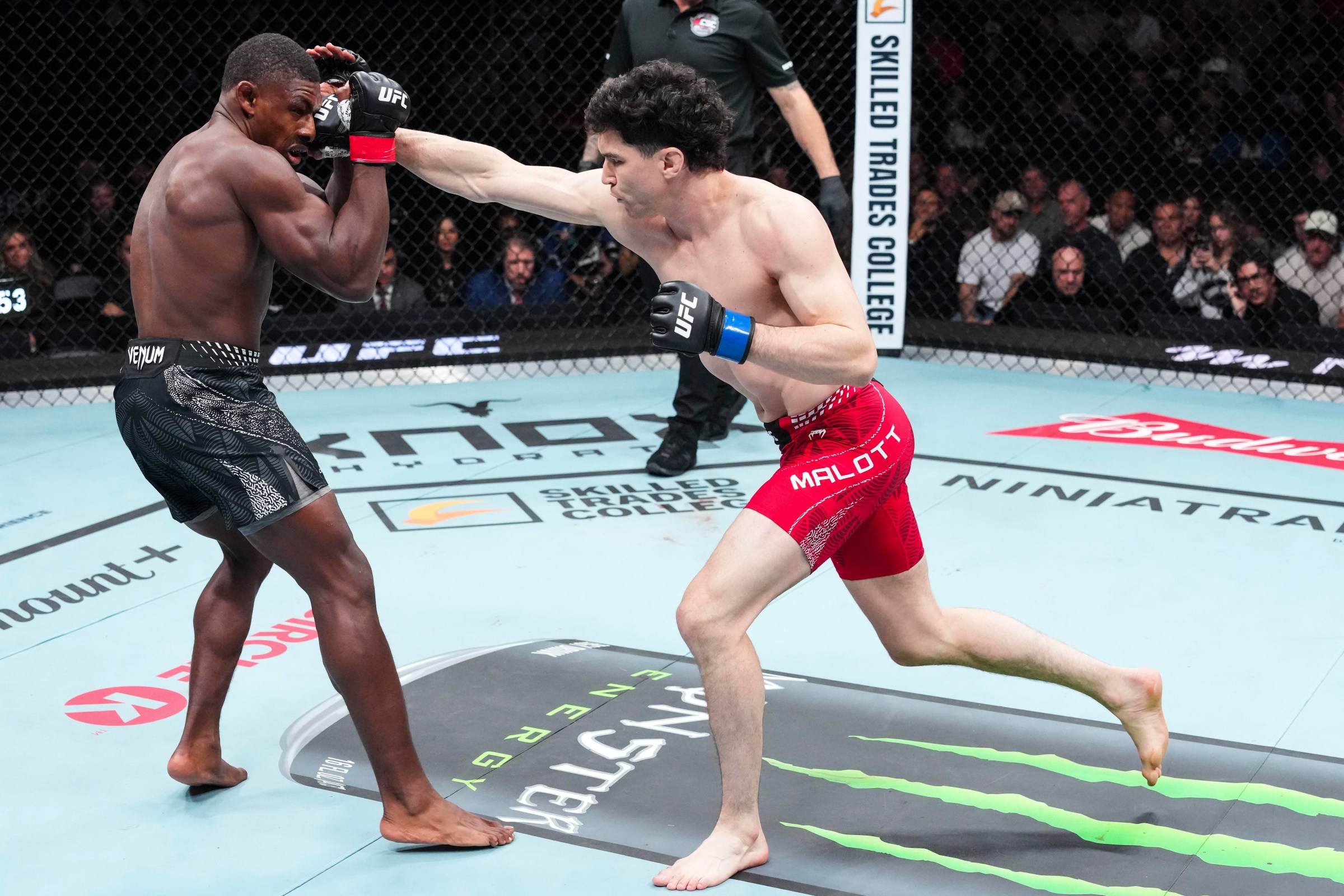 EDMONTON, ALBERTA - OCTOBER 17: Mike Malott of Canada throws a punch against Joaquin Buckley in their welterweight fight during UFC Fight Night event at Rogers Centre on October 17, 2026 in Edmonton, Alberta, Canada. (Photo by Ed Mulholland/Zuffa LLC)