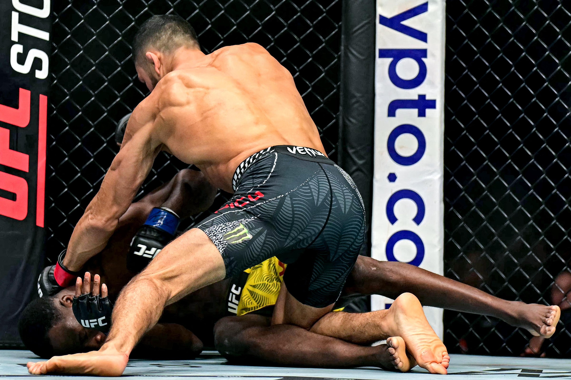 The US’ Aaron Pico and Belgium’s Losene Keita compete in their men’s featherweight fight during the UFC Fight Night event at Etihad Arena in Abu Dhabi on October 24, 2026. (Photo by Giuseppe CACACE / AFP via Getty Images)