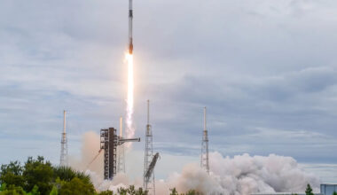Elon Musk's SpaceX reports a profit and he hints at a possible merger with Tesla
