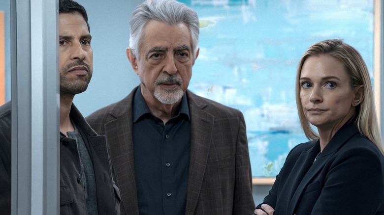 Jennifer Jareau, Luke Alvez with David Rossi in the middle in front of a light blue background