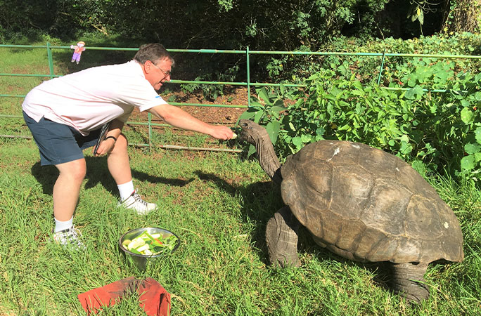 Former St Helena Governer Mark Capes feeding Jonathan
