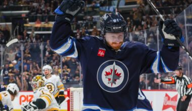 Jets fall in OT to Bruins in home opener