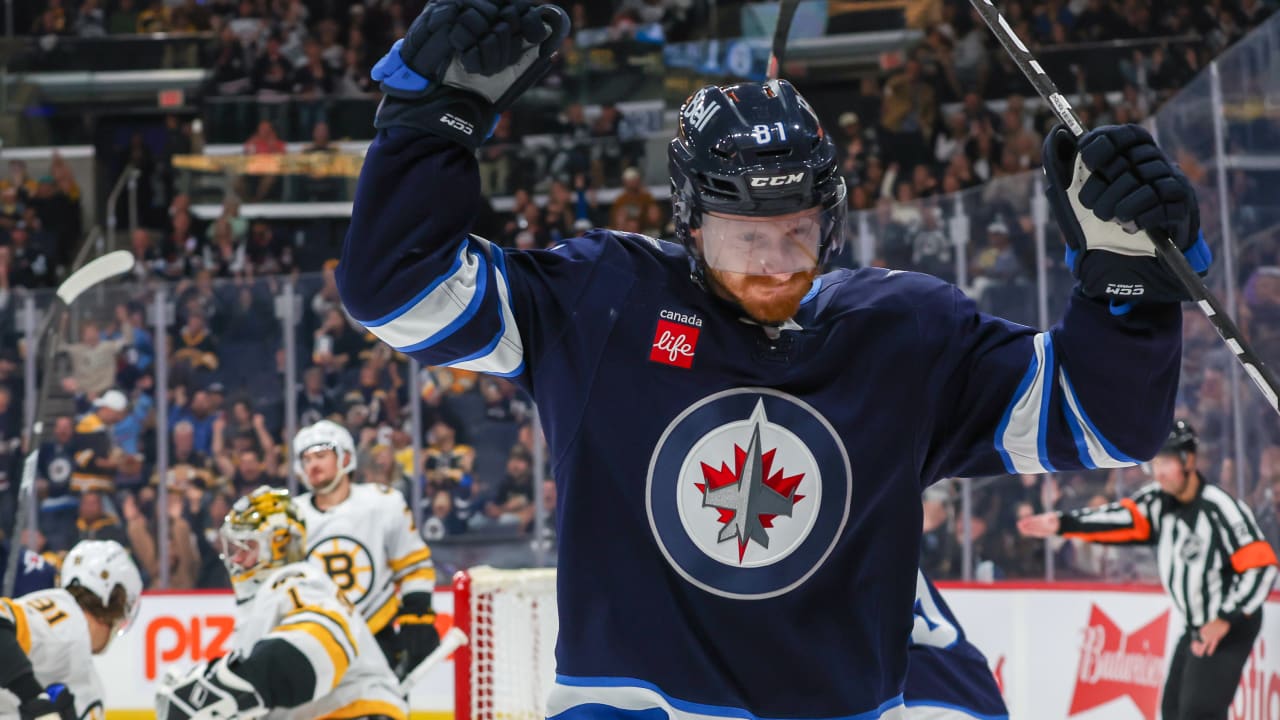 Jets fall in OT to Bruins in home opener