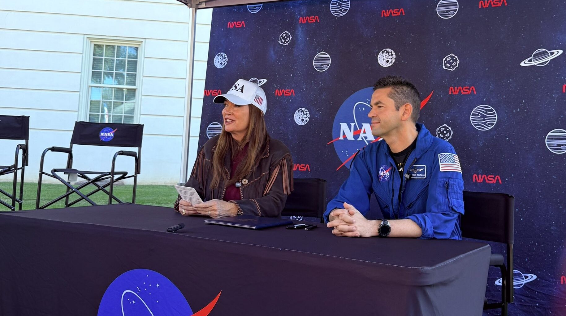 U.S. Secretary of Agriculture Brooke Rollins, left, and NASA Administrator Jared Isaacman signed a Memorandum of Understanding advancing agriculture and Earth science during an event at the University of Alabama in Tuscaloosa on Saturday, Oct. 24.