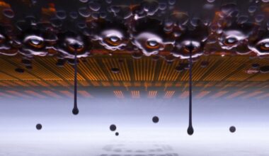 microscopic view of an inkjet printer depositing ink onto paper