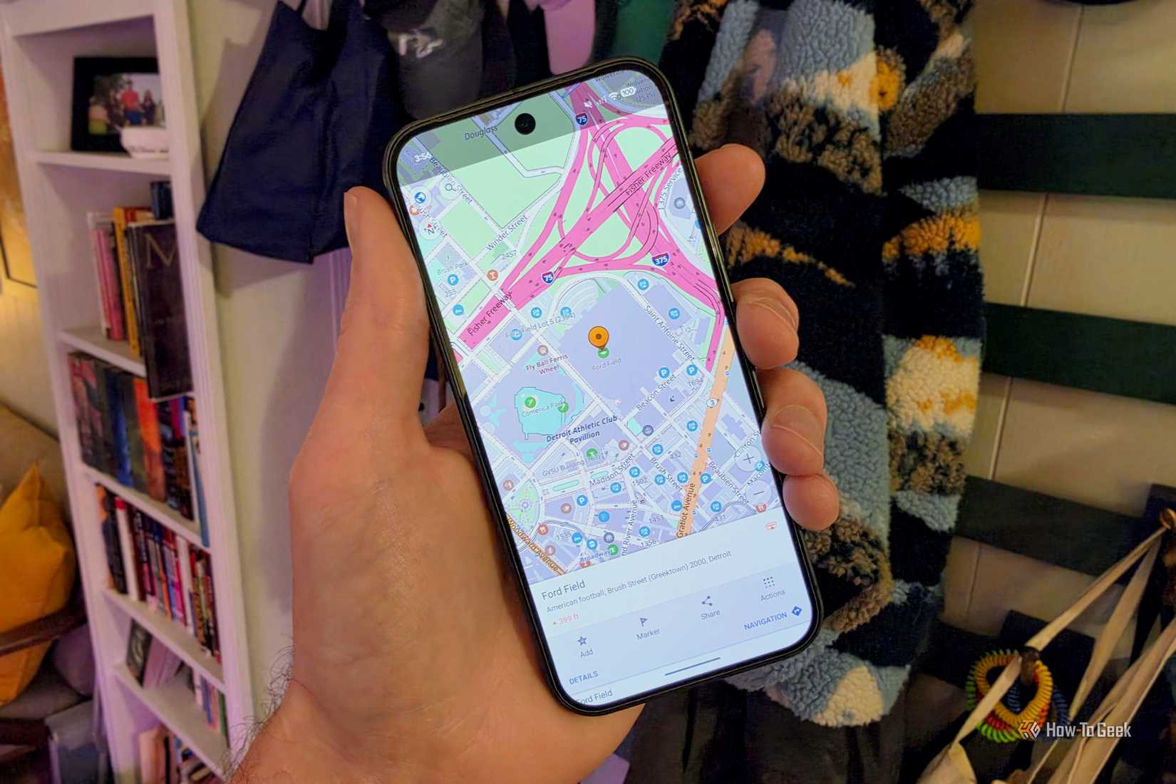 The OsmAnd Maps Android app is visible on a Pixel phone.