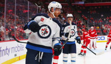 Connor scores twice on power play, Jets edge Red Wings for first win of season