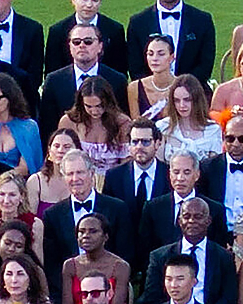 Leonardo DiCaprio and Vittoria Ceretti attending a wedding in Hawaii.