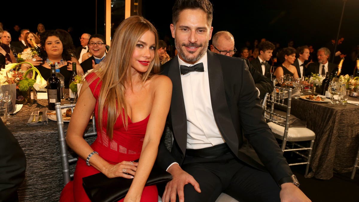 Sofia Vergara and Joe Manganiello stand onstage at the Screen Actors Guild Awards.