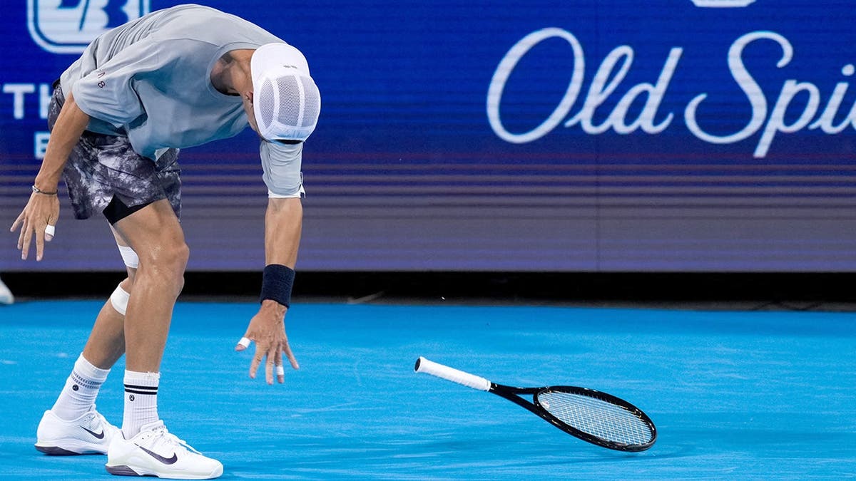 Terence Atmane tosses his racket during a match at the Cincinnati Open.