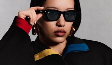 The LED light shines as a woman records with Ray-Ban Meta smart glasses.