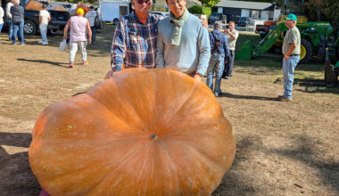 Port Elgin Pumpkinfest champion Todd Kline from Quebec poses with Han Suk-Joon, a South Korean television presenter who was in Port Elgin filming a documentary on Ontario. Greg Cowan/The Sun Times
