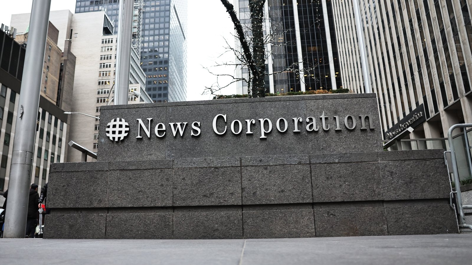 Murdoch family settles dispute on control of media assets
