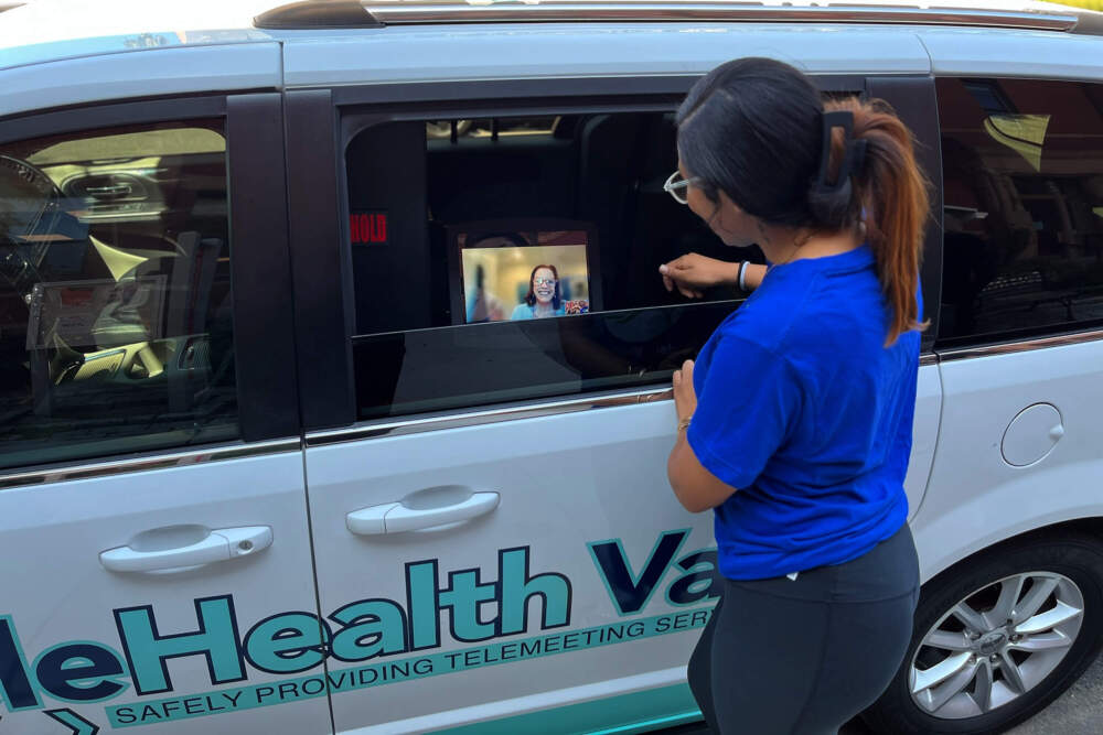 The TeleHealth Van parked outside Northeastern Hillel is part of a new initiative to connect local college students with counseling resources. (Emily Piper-Vallillo/WBUR)