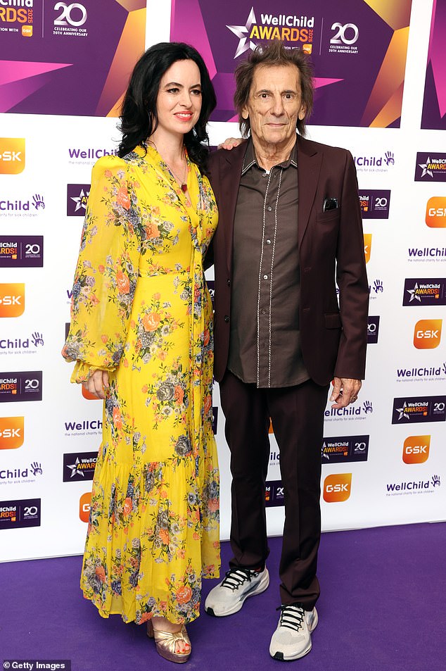 Ronnie Wood and his wife Sally were also in attendance for the awards, with the producer dressed in yellow for the event