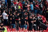 thumbnail: Riot police in the stands with Serbia fans in Belgrade. Photo: Bradley Collyer/PA Wire