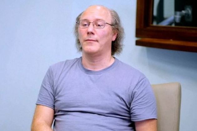 Man arrested after admitting on TV he killed and buried his parents