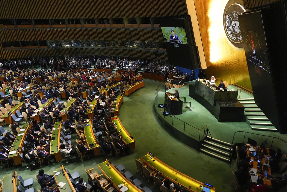 Emmanuel Macron speaks during a meeting at the United Nations (Yuki Iwamura/AP)