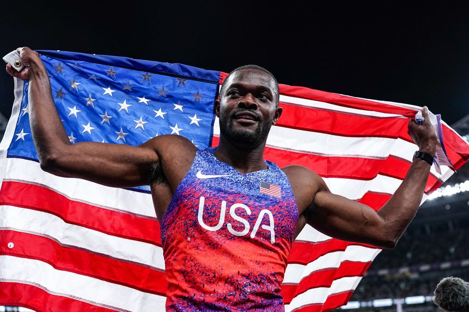 Rai Benjamin of the United States celebrates the victory and winning the gold
