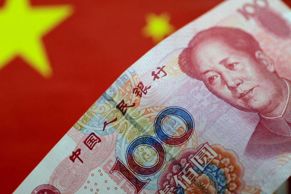 FILE PHOTO: A China yuan note is seen in this illustration photo May 31, 2017.     REUTERS/Thomas White/Illustration/File Photo
