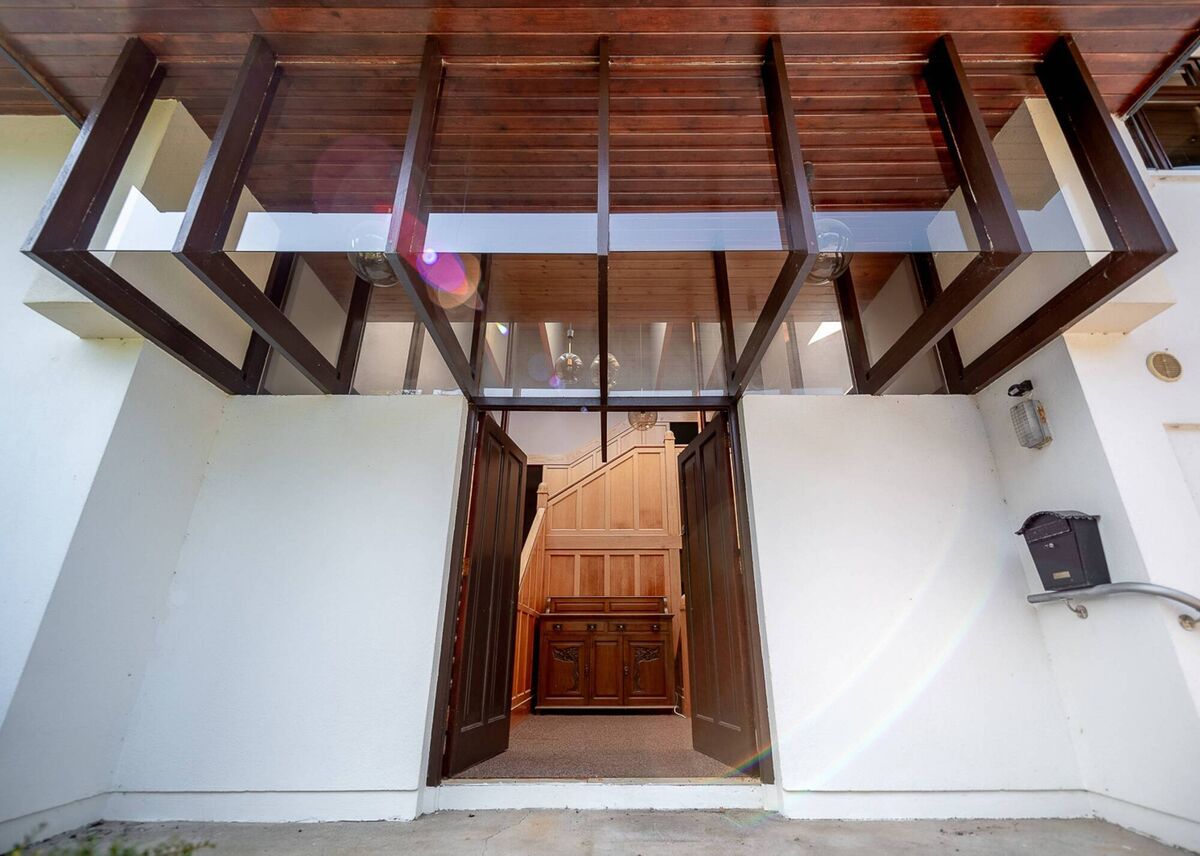 Eye catching cantilevered panels above the main entrance