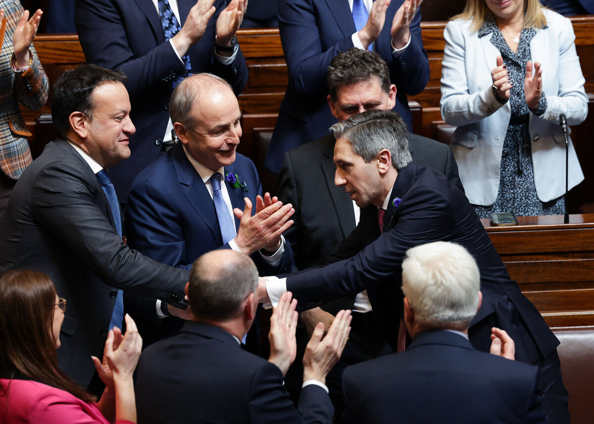 Leo Varadkar, former taoiseach, Taoiseach Micheál Martin TD and Tánaiste Simon Harris speaking in the Dáil Chamber, Leinster House. File picture