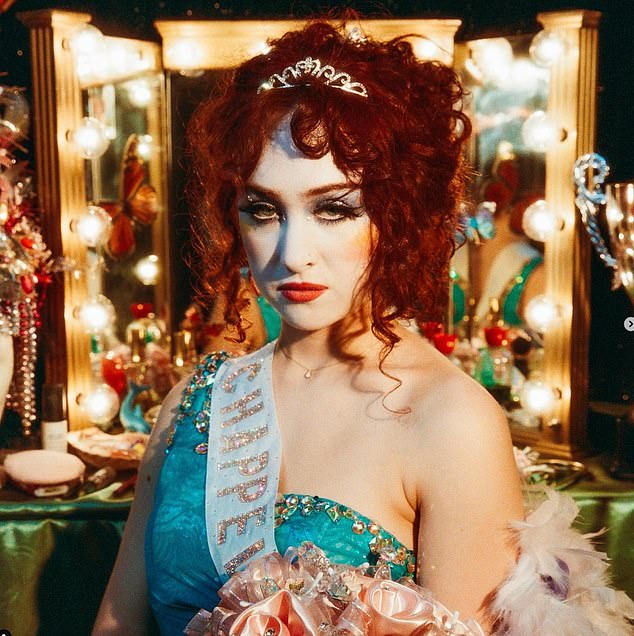 Her voluminous fiery curls were one of the highlights of her cover for her 2023 album The Rise and Fall of a Midwest Princess (pictured)