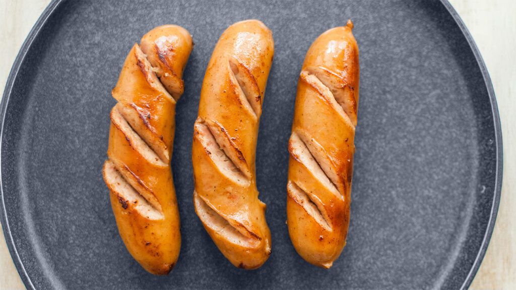 three fried sausages