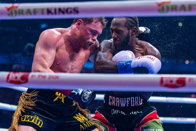 Three-weight undisputed world champion Terence Crawford ordered out of car at gunpoint by police after hometown parade