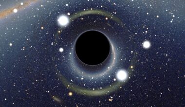 An illustration of a black hole in front of starry outer space