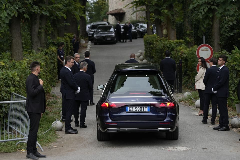 The hearse carrying designer Giorgio Armani to his funeral (Luca Bruno/AP)