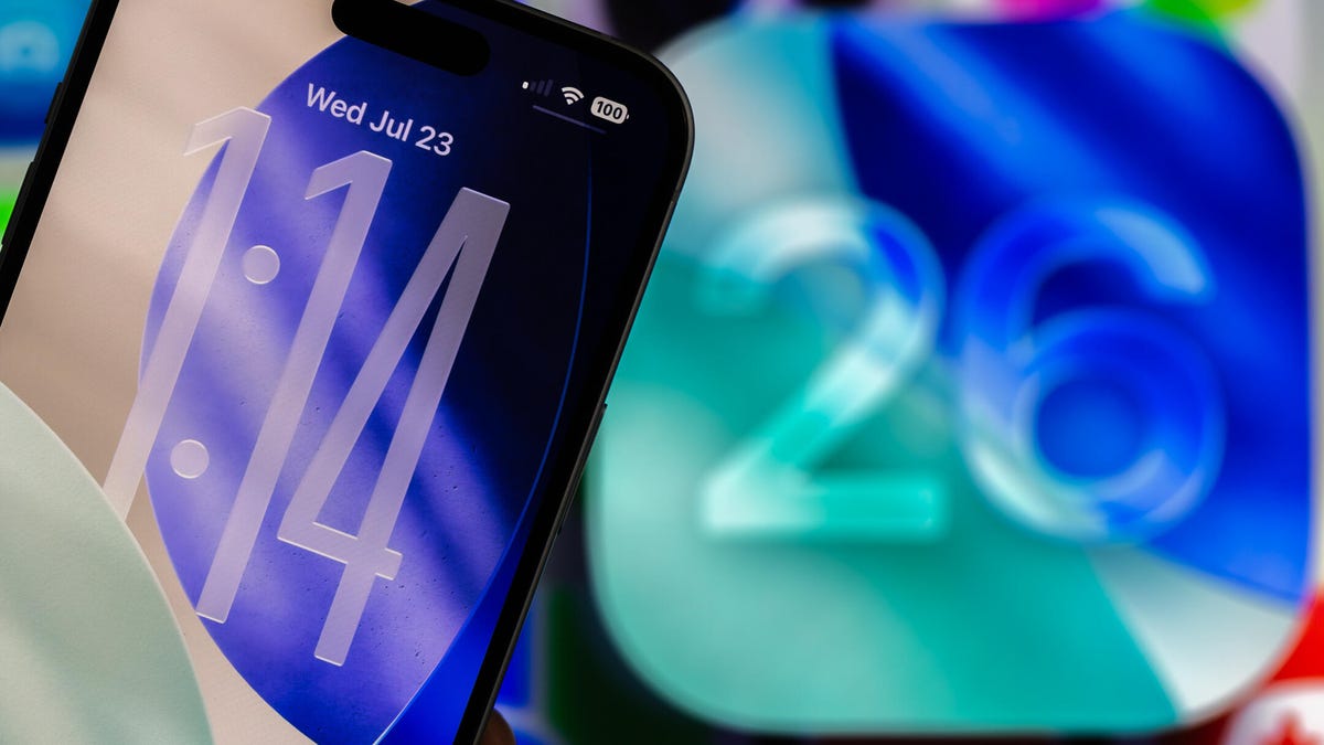 An iPhone lock screen with a clear clock next to the number 26.