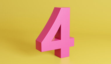 A pink number four on a yellow background