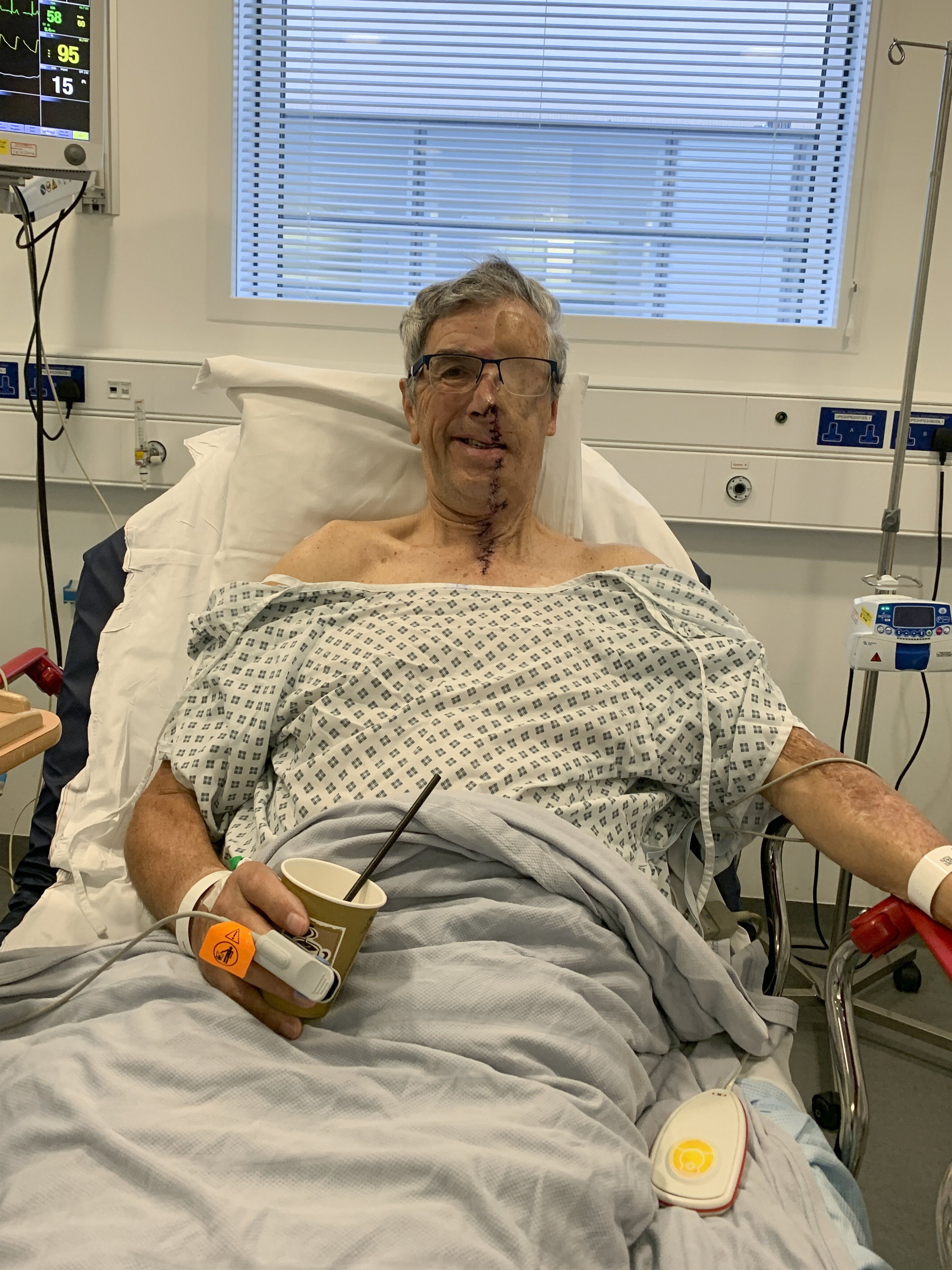 Dave Richards in his hospital bed after the crash.