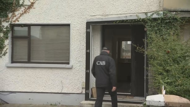 CAB officer at three-bedroom terrace house in Sarsfield Court (rte)