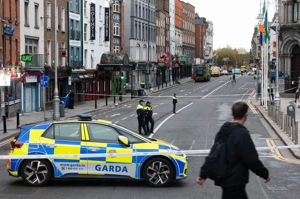 Gardai at the scene of the fatality Dame street, Dublin which was closed to traffic.  Photo: Sam Boal /Collins Photos