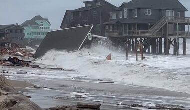 Waves from Hurricanes Humberto and Imelda hit a home in Buxton, North Carolina, yesterday