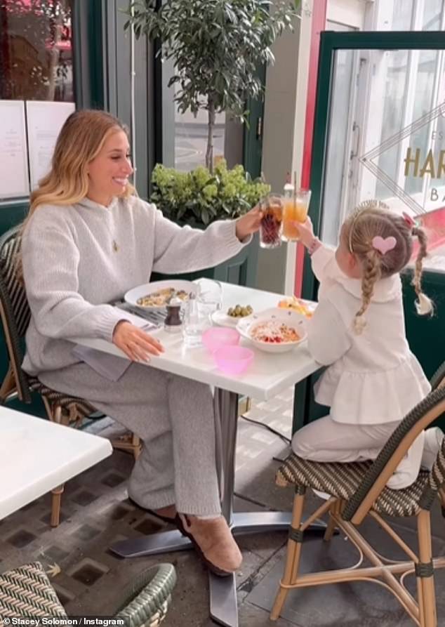 Stacey cut a casual figure in a grey tracksuit and fur shoes as she enjoyed lunch with Rose