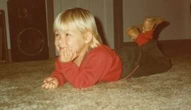 This Aussie star looks unrecognisable in a childhood photo from before he grew up to join one of the most iconic bands in history