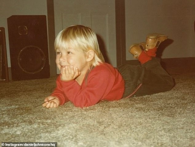 This Aussie star looks unrecognisable in a childhood photo from before he grew up to join one of the most iconic bands in history