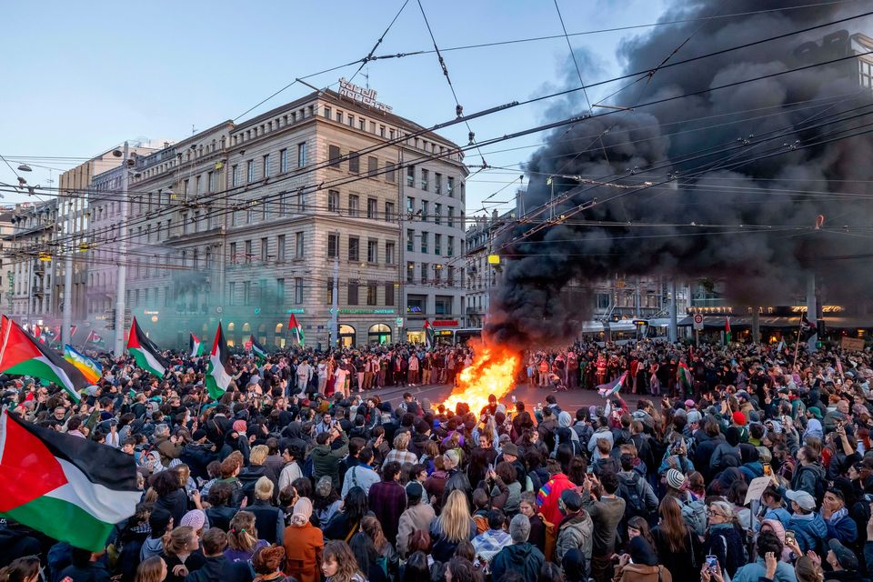 Protesters take part in a rally in support of the Gaza flotilla boats, in Geneva, Switzerland, Thursday, Oct. 2, 2025. (Magali Girardin/Keystone via AP)
