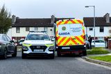 thumbnail: Gardaí and forensic collision investigators at the scene of a road crash in Jobstown, Dublin. Photo: Damien Storan