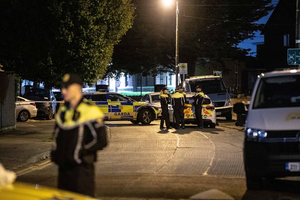 Gardaí at the scene of a shooting in Bluebell, Dublin. Photo: Damien Storan.
