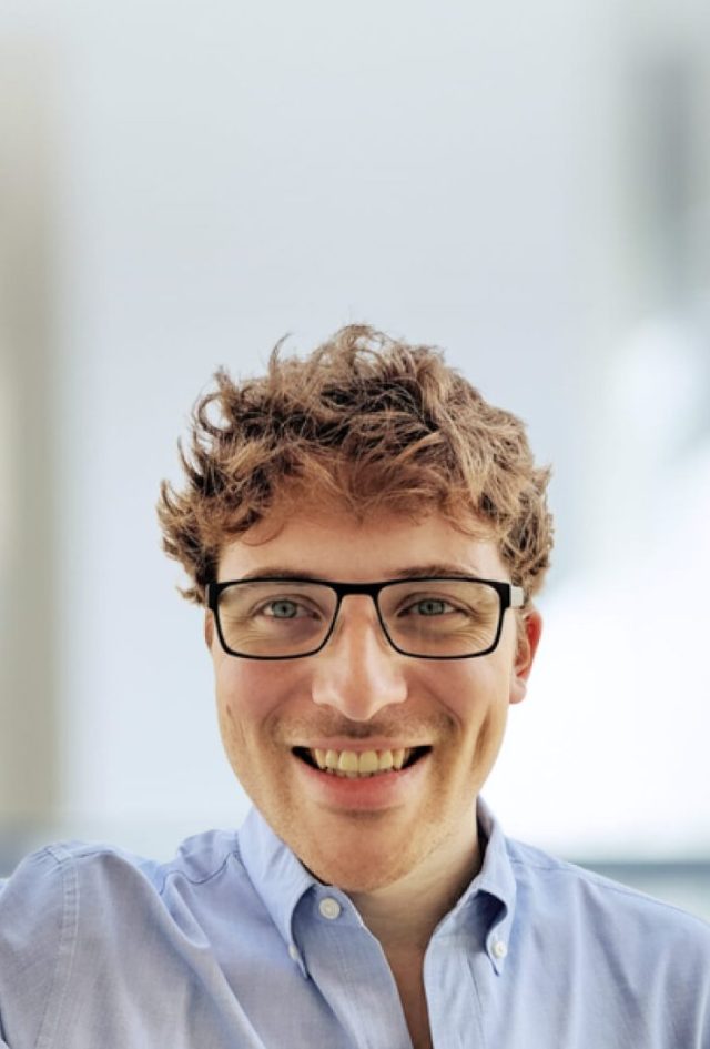 A smiling photo of Ambrose Carr, senior director of data at CZI.