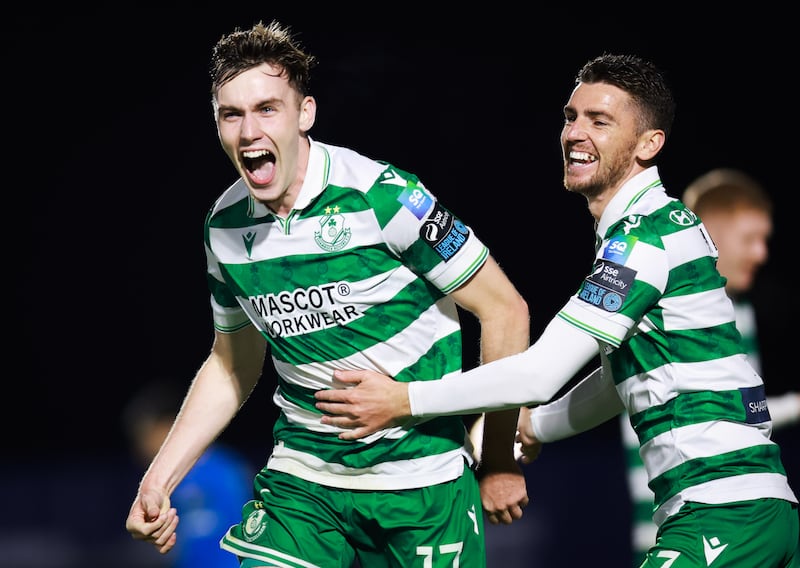 Matthew Healy celebrates with Dylan Watts after scoring his side's second goal against Waterford at the RSC. Photograph: Tom Maher/Inpho