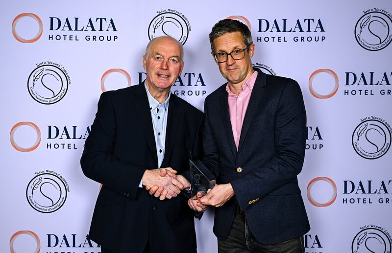 Larry Tompkins of Cork is presented with his Gaelic Football Hall of Fame award by Ronan McCormack, Planning and Sponsorship Manager at Dalata Hotel Group, right, ahead of the Gaelic Writers Association Awards, proudly supported by Dalata Hotel Group at the Clayton Hotel in Ballsbridge, Dublin. Picture: Piaras Ó Mídheach/Sportsfile